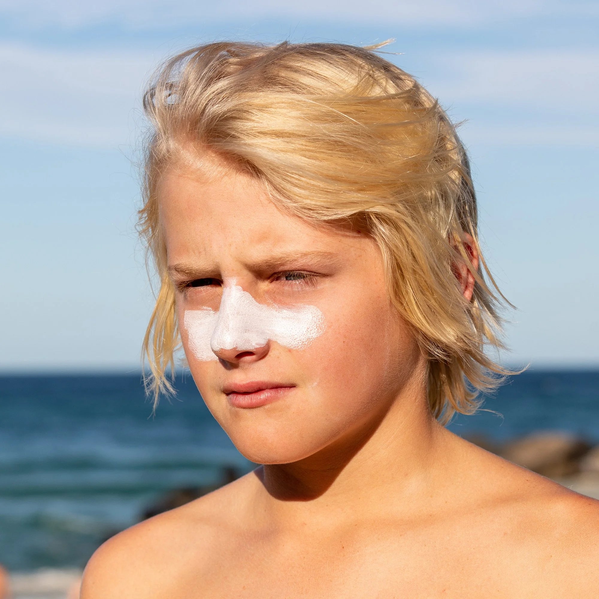Sun Zapper Zinc Stick applied to face
